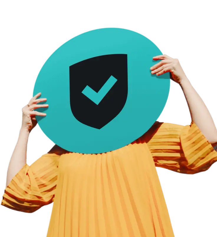 A person in a yellow tshirt holding a rounded illustrated sign of a checkmark in front of their face.